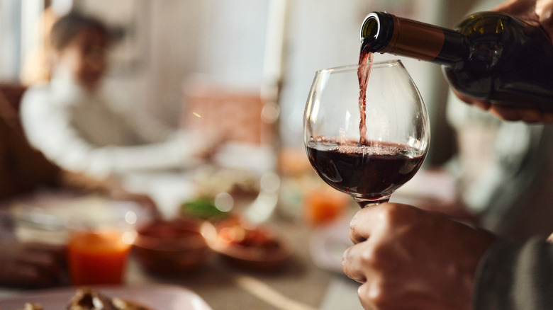 Pouring a glass of wine