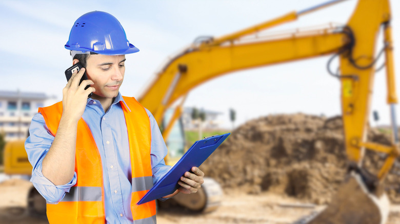 architect on phone at a site