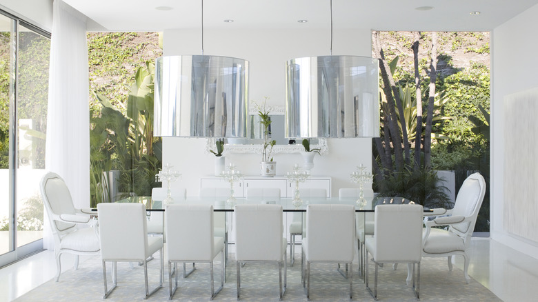 Dining room with oversized lighting