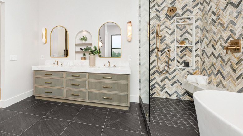 Bathroom with black herringbone tiles