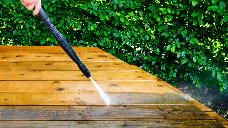 Power washing a deck