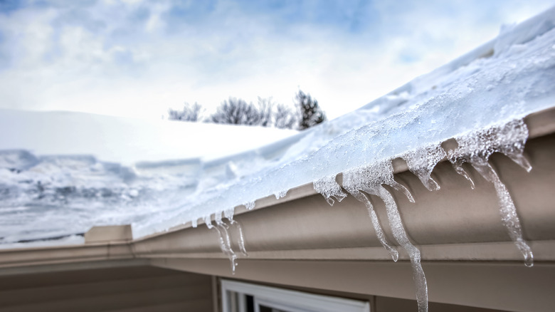 Ice frozen on roof in winter