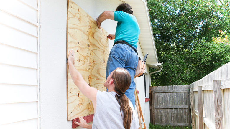 using plywood to board windows