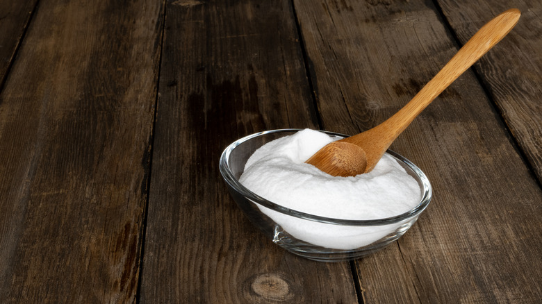 bowl of baking soda on wood floor