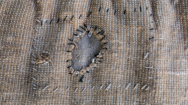 fixing a rip in a fabric bag