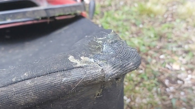 epoxy fabric patch on lawn mower bag