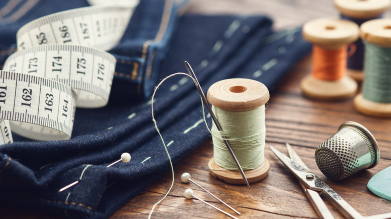 needle, thread, and sewing supplies