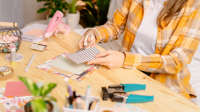 woman doing paper crafts