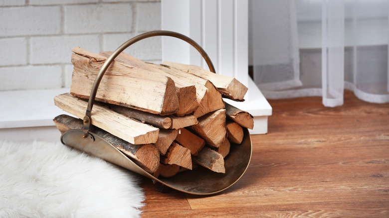 Firewood in a metal holder