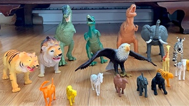 Toy animals on wood floor