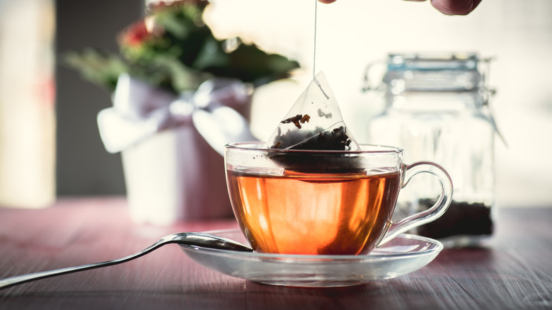 Cup with used tea bag