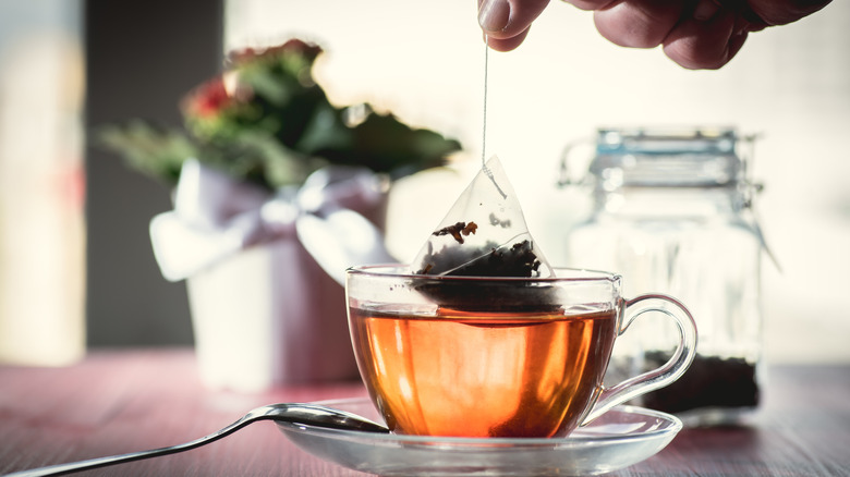 Cup with used tea bag