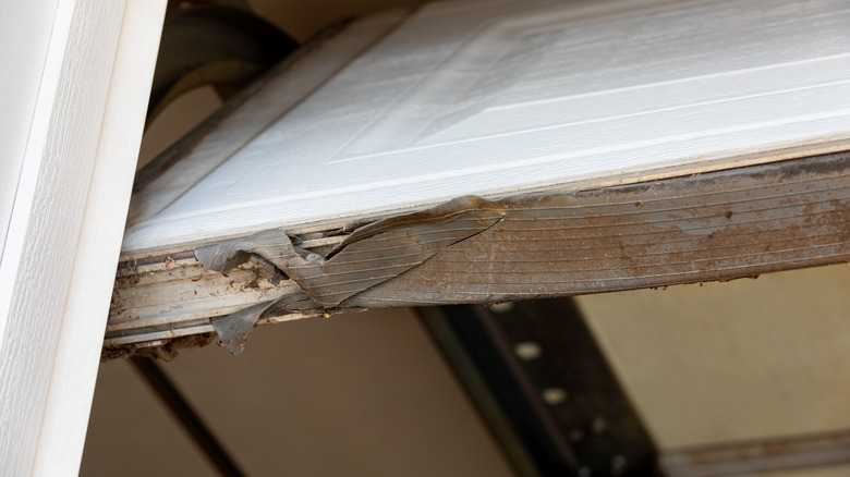 Broken weatherstripping on a garage door
