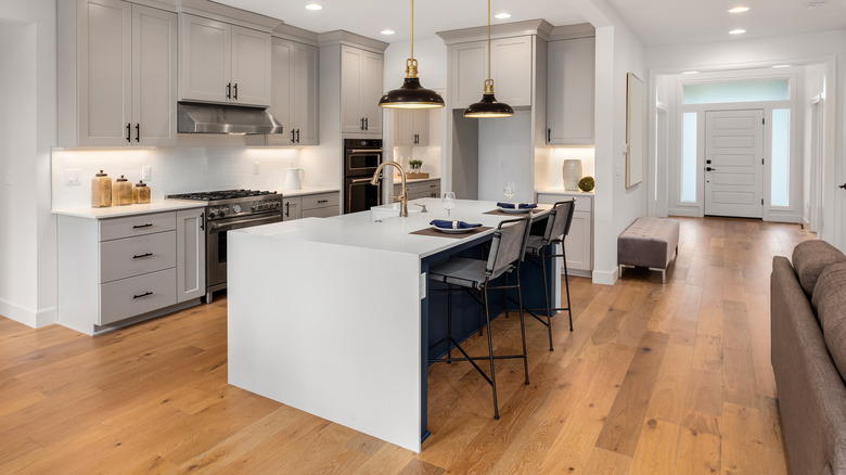hardwood floors in white kitchen