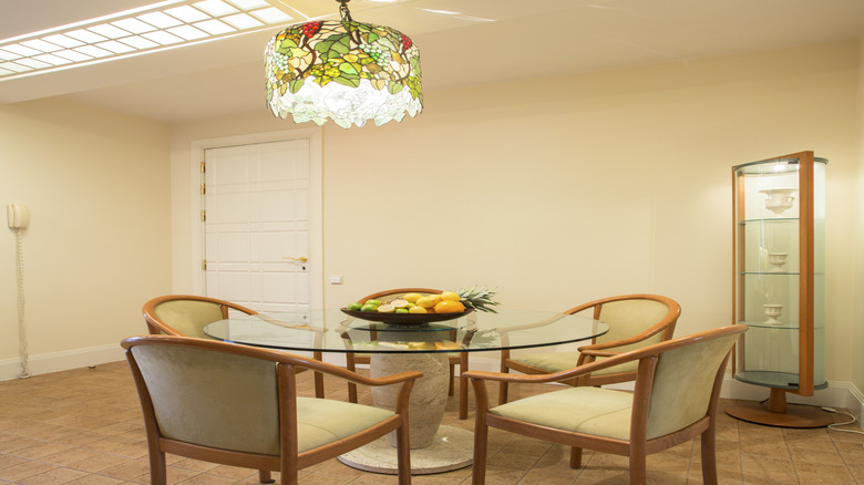 A patterned stained glass chandelier hanging from the ceiling.