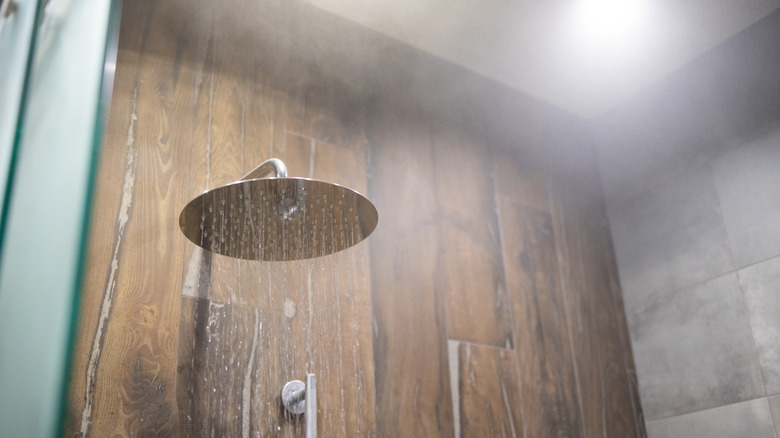 Close-up of hot water flowing through shower