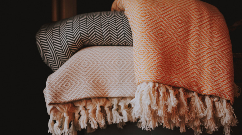 Three throw blankets.