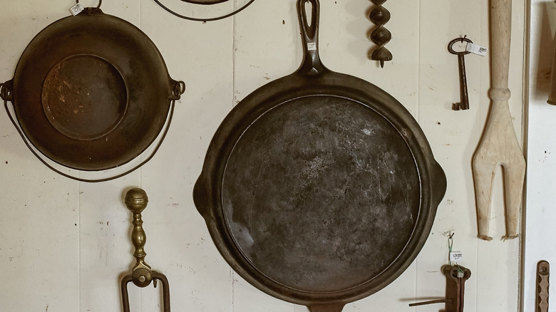 Cast-iron cookware on wall