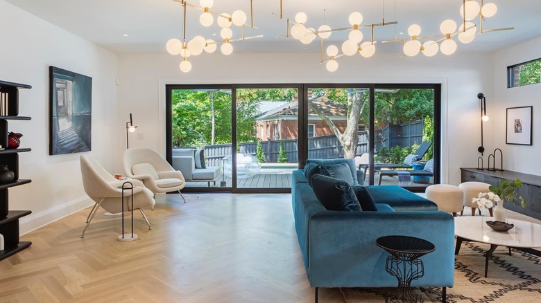 Hilary Farr sitting in her living room
