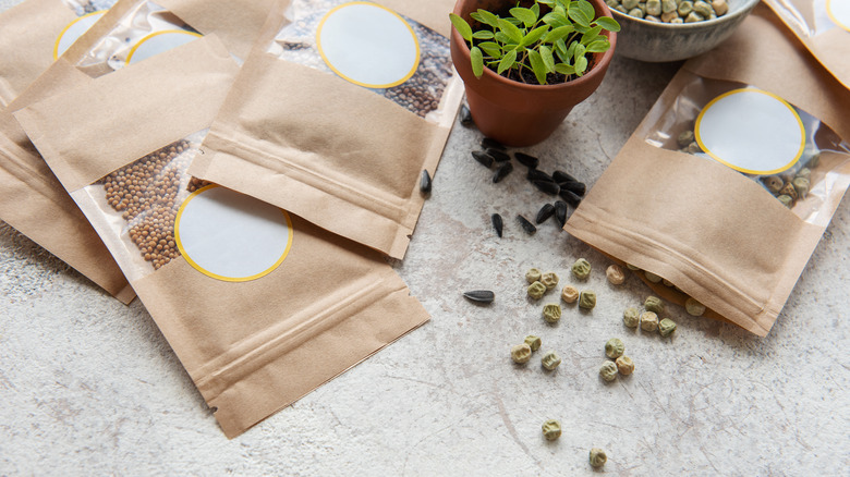 seeds spilling from airtight bags