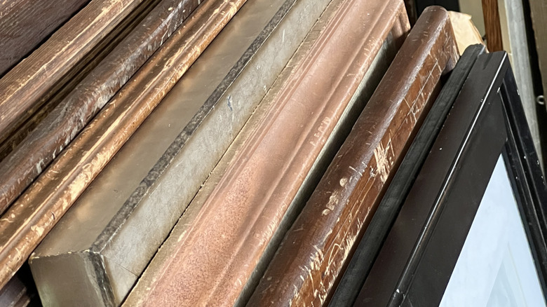 Old frames stacked on their sides