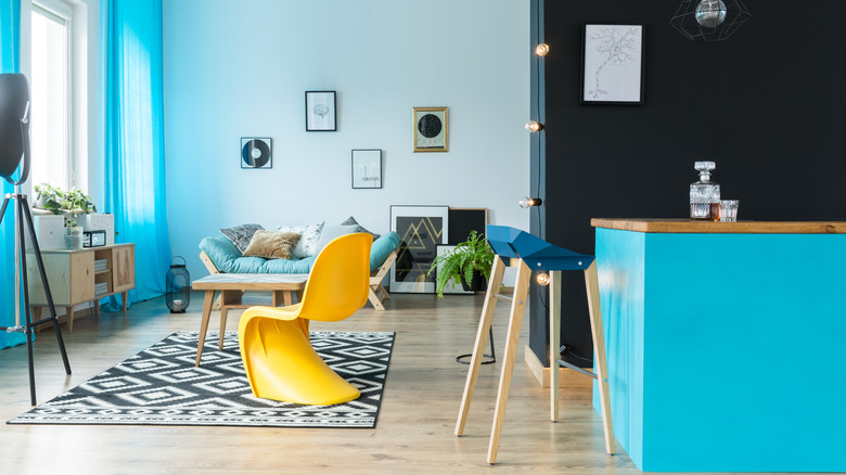 A modern living room with bright blue colors