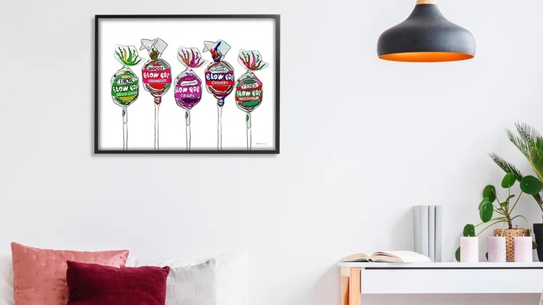 "Modern Lollipop Candy" wall art with a black frame
