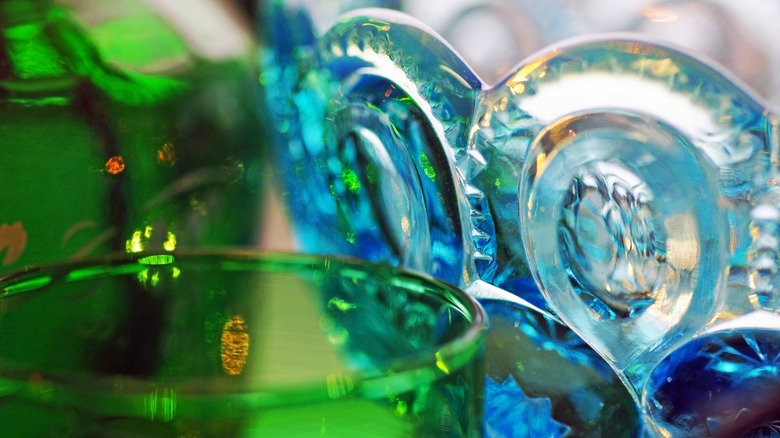 Close up of colored glass dishes