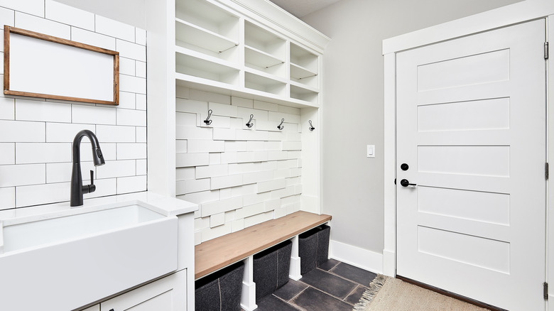 functional mudroom with shelves and cubbies