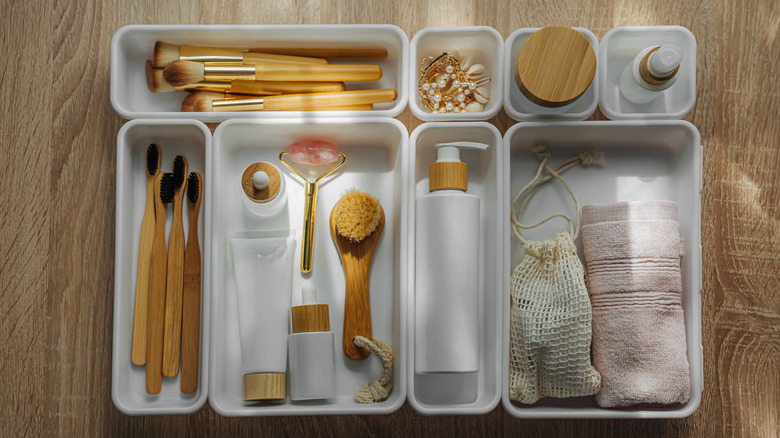 Bathroom essentials stored in drawer organizers
