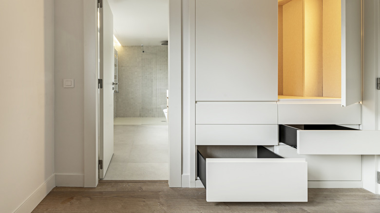 Bedroom with built in closet and ensuite bathroom