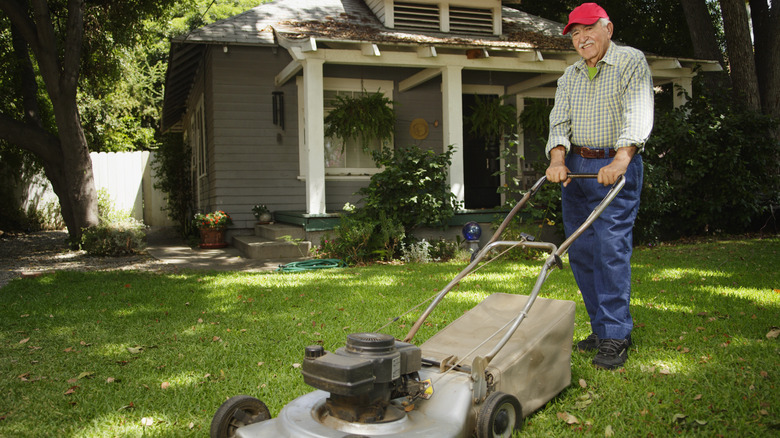 man mowing lawn