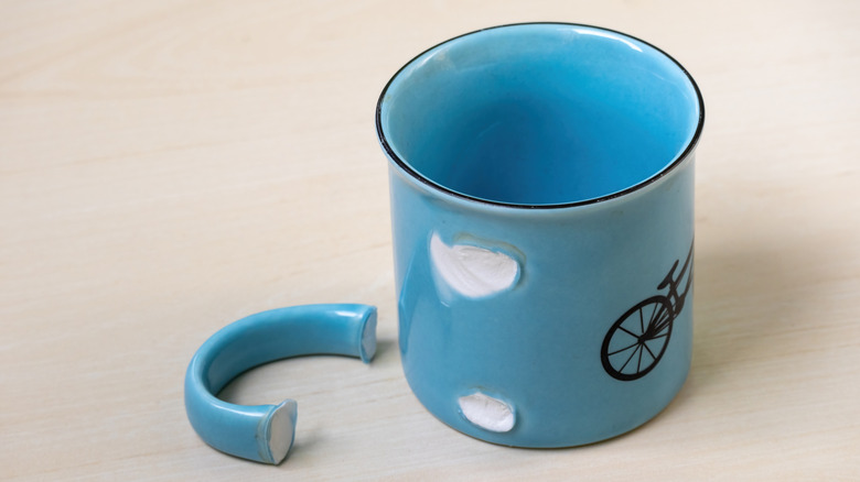 Blue mug with a broken handle