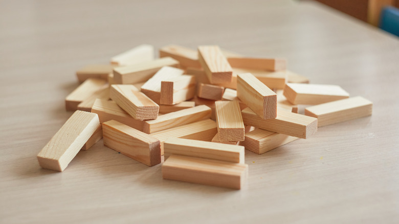 A pile of Jenga blocks
