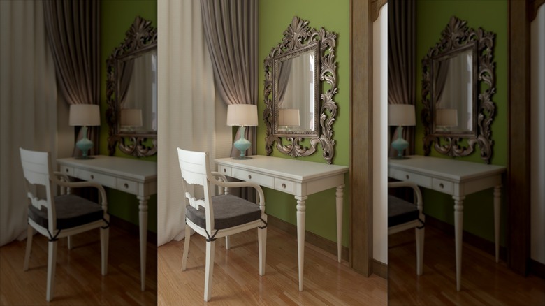 wall-mounted mirror over desk vanity