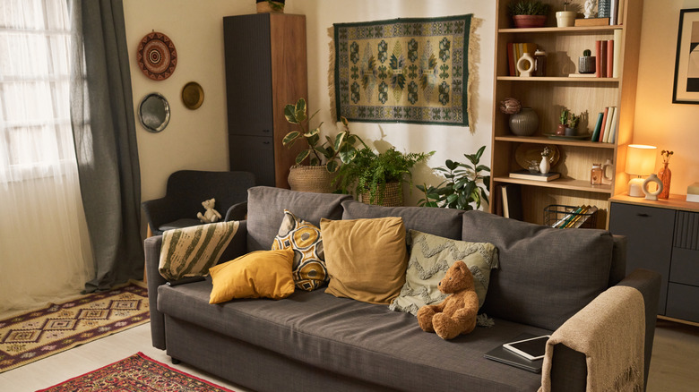 Living room with wall hanging and no visible rod