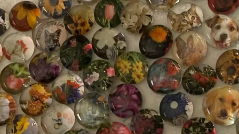 Images glued onto the backs of Dollar Tree glass gems