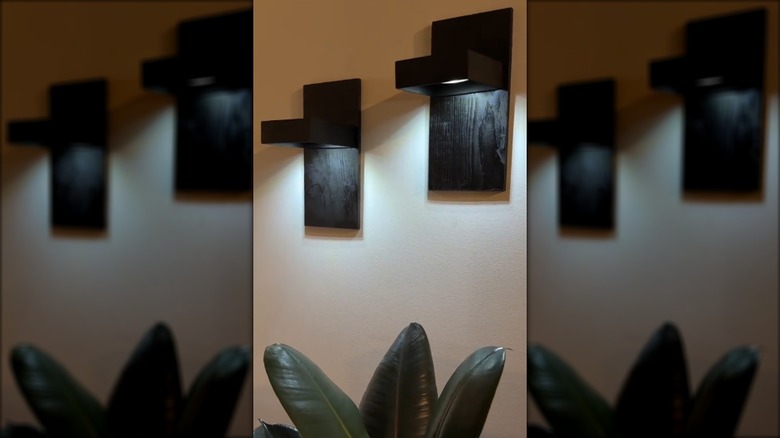 Dollar Tree items used to DIY modern wall lighting.