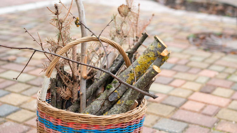 basket of logs and twigs for a brush pile