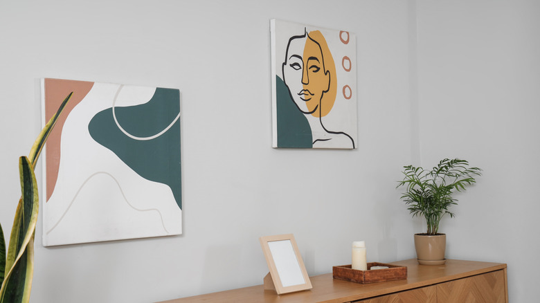 How To Turn Wall Art Into A Stylish, Clever Hiding Spot For Keys