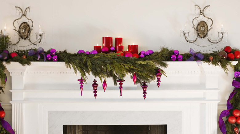 Garland and candles on a mantel
