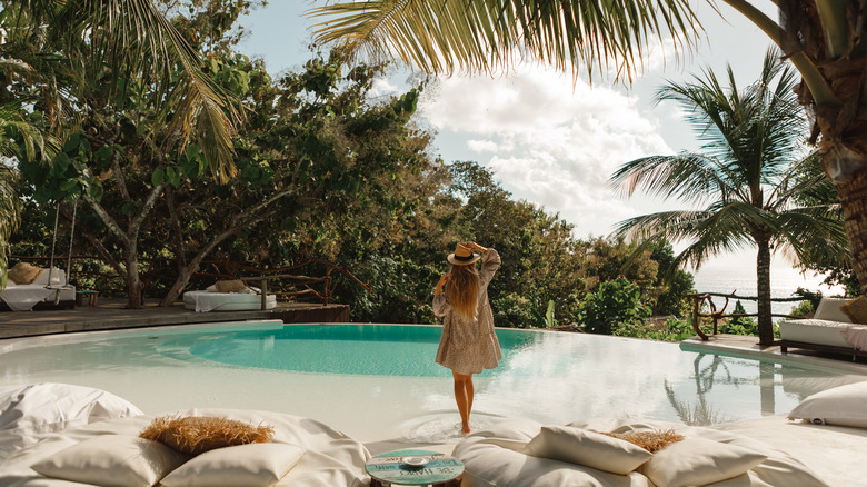 woman swimming pool pillows