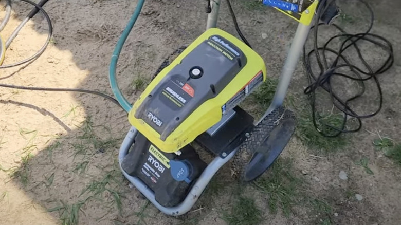 Preparing to unclog a Ryobi pressure washer
