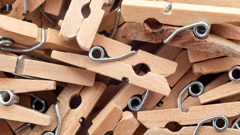 Wooden clothespins in a pile