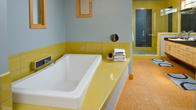 Pale blue and bright yellow bathroom