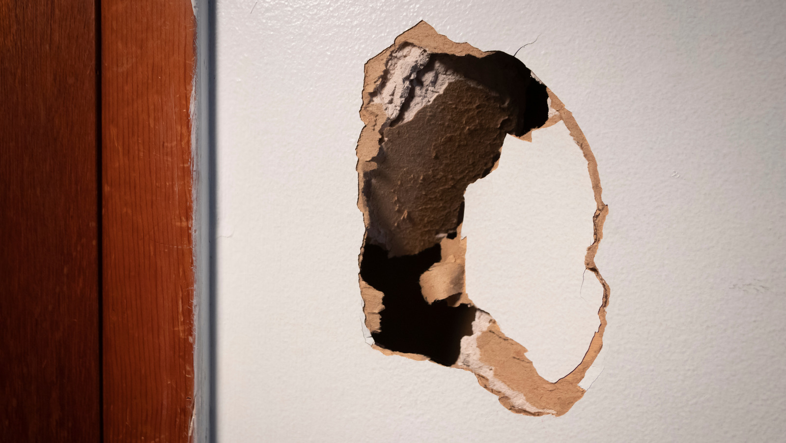 How To Use A Piece Of Scrap Wood To Make Patching Drywall Easier