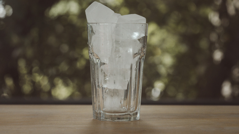 ice cubes in glass on counter