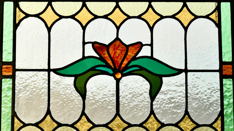 Stained glass panel, made around the turn of the century from glass pieces saved from old torn down buildings in the inner city of Montreal