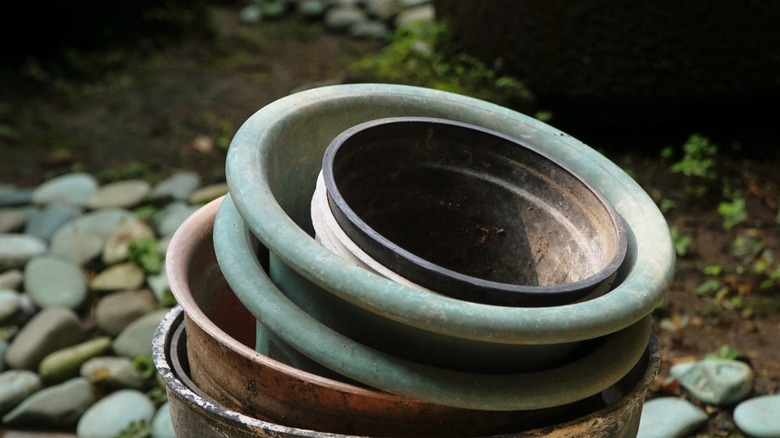 stacking pots on walkway