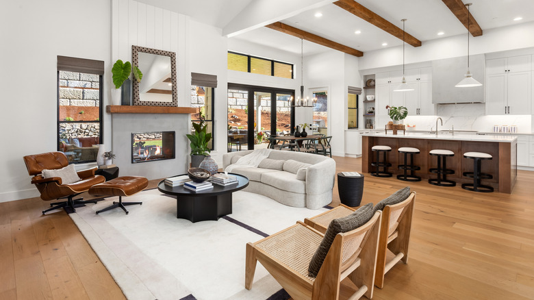 Living room and kitchen in new luxury home with open concept design